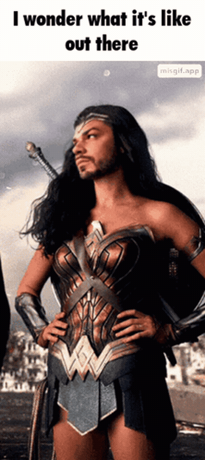 Woman In Wonder Woman Costume With Sword GIF