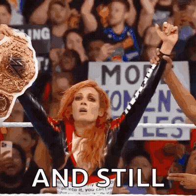 Woman In Wrestling Ring Holding Championship Belt Saying And Still GIF