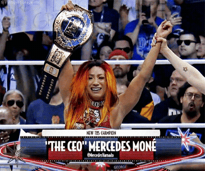 Woman In Wrestling Ring Holding Championship Belt The CEO Mercedes Moné GIF