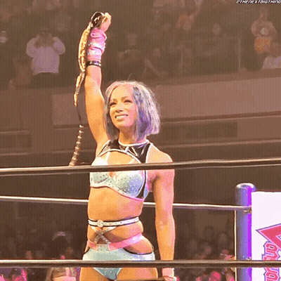 Woman In Wrestling Ring Holding Trophy Saying Next Thing GIF
