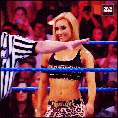Woman In Wrestling Ring With Fabulous On Waist GIF