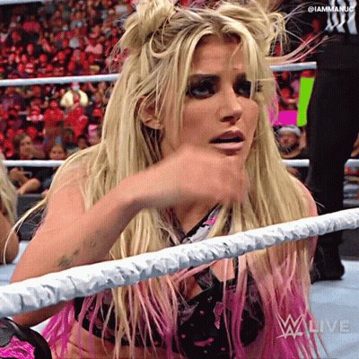 Woman In Wrestling Ring With Iammaniac Sign GIF