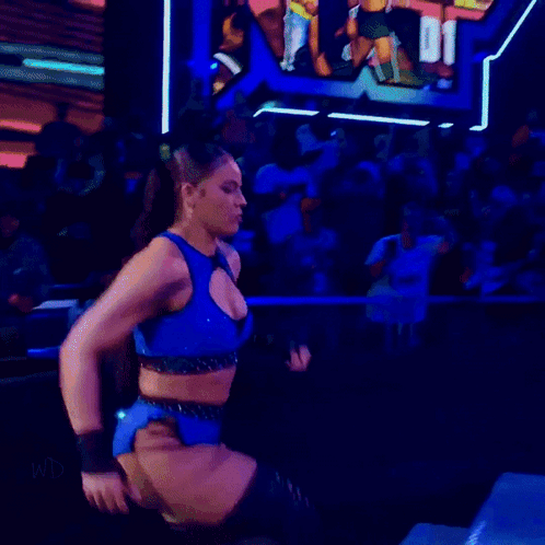 Woman in Wrestling Ring With Lakers Jersey