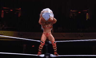 Woman In Wrestling Ring With Letter W GIF