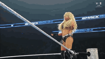 Woman In Wrestling Ring With Live Kansas City Sign GIF