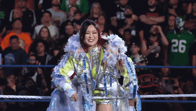 Woman In Wrestling Ring With Number 26 Jersey GIF