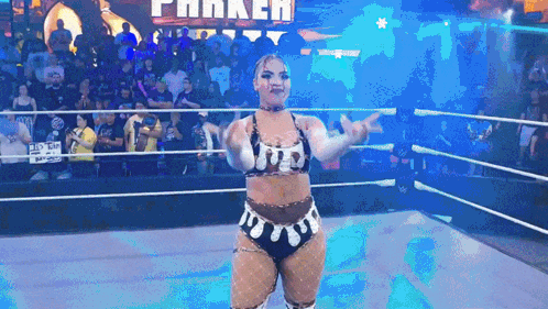 Woman in Wrestling Ring with Parker Sign