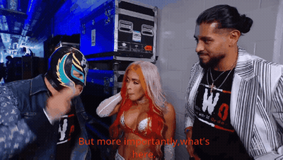 Woman In Wrestling Ring With Referee GIF