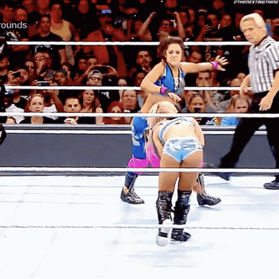 Woman In Wrestling Ring With Rounds GIF