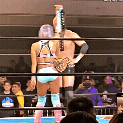 Woman In Wrestling Ring With The Next Thing Belt GIF