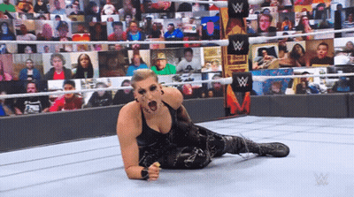 Woman In Wrestling Ring With W Logo GIF