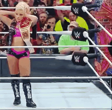 Woman In Wrestling Ring With WWE Belt GIF