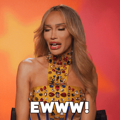 Woman In Yellow And Blue Dress Saying Eww GIF