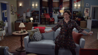 Woman In Yellow And Man In White Dancing GIF