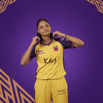 Woman In Yellow And Purple Shirt Saying Kay GIF