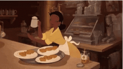 Woman In Yellow Apron Serving Food GIF