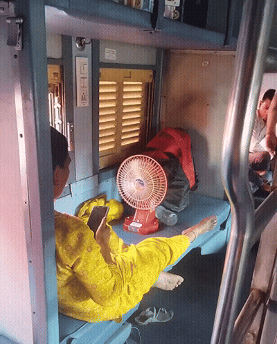 Woman In Yellow Dress Beside Red Fan Saying LG GIF