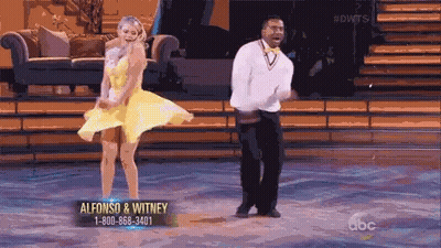 Woman In Yellow Dress Dancing On Dancing With The Stars GIF