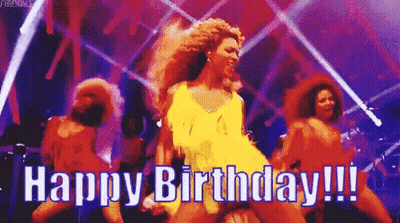 Woman In Yellow Dress Dancing On Stage Says Happy Birthday GIF