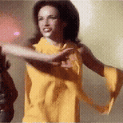 Woman In Yellow Dress Dancing GIF
