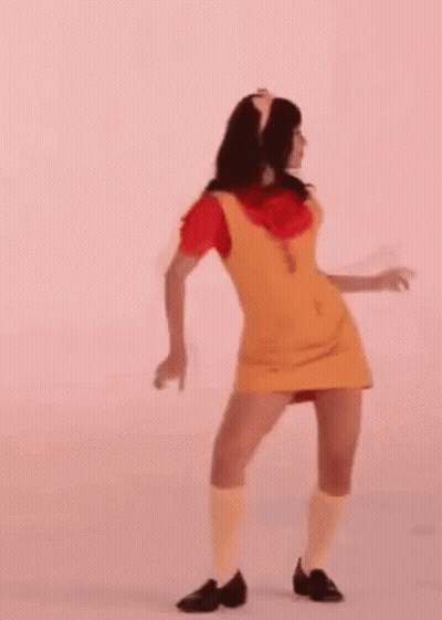 Woman In Yellow Dress Dancing GIF
