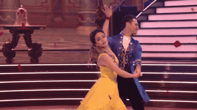 Woman In Yellow Dress Dancing With Man GIF