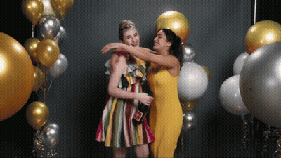 Woman In Yellow Dress Hugging GIF