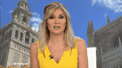 Woman In Yellow Dress In Front Of Noticias Building GIF