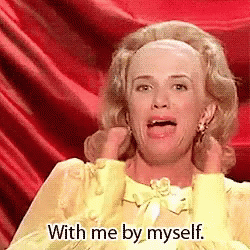 Woman In Yellow Dress Making Funny Face GIF