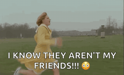 Woman In Yellow Dress Running Through Grassy Field GIF