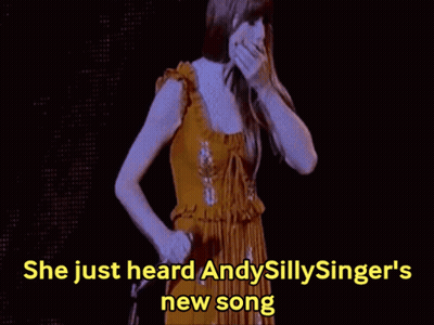 Woman In Yellow Dress Singing She Just Heard Andysillysinger's New Song GIF
