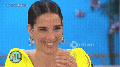 Woman In Yellow Dress Smiling With Eltrece GIF