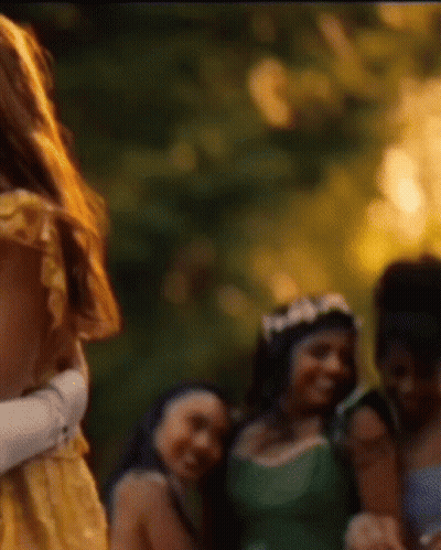 Woman In Yellow Dress Standing GIF