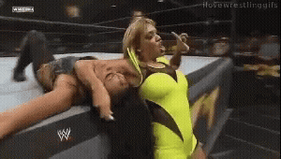 Woman In Yellow Dress Wrestling In Ring GIF