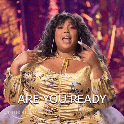 Woman In Yellow Floral Dress Asks Are You Ready GIF