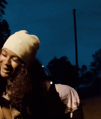 Woman In Yellow Hat Close Up GIF