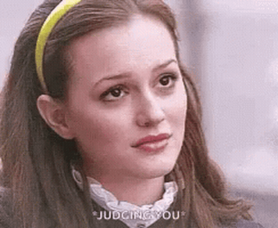 Woman In Yellow Headband And White Collar GIF