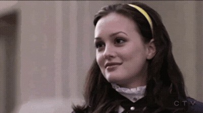 Woman In Yellow Headband Smiling GIF