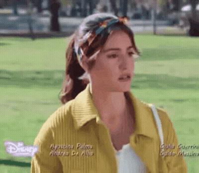 Woman In Yellow Jacket And Headband GIF