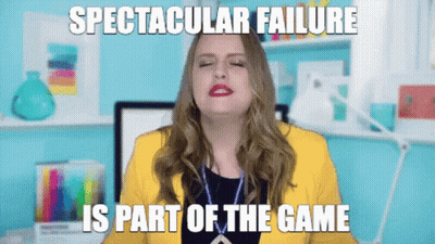 Woman In Yellow Jacket Funny Face Spectacular Failure Part Of The Game GIF