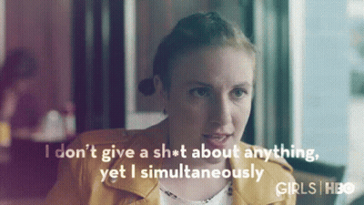 Woman In Yellow Jacket Saying I Don't Give A Sh*t GIF