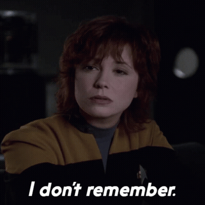 Woman In Yellow Jacket Saying I Don't Remember GIF