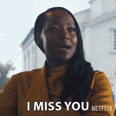 Woman In Yellow Jacket Saying I Miss You GIF