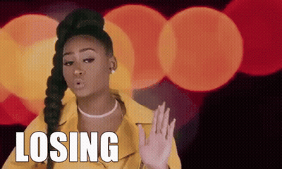 Woman In Yellow Jacket Saying Losing GIF