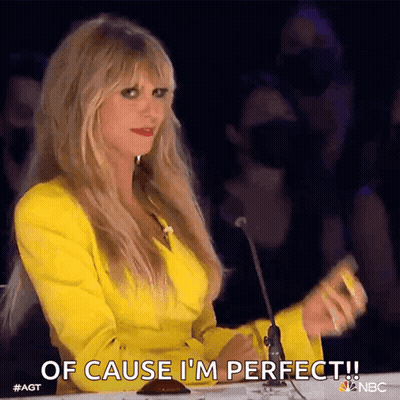 Woman In Yellow Jacket Saying Of Cause I'm Perfect GIF
