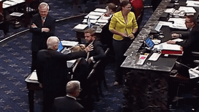 Woman In Yellow Jacket Speaking GIF