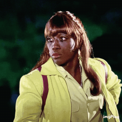 Woman In Yellow Jacket With Word Imgplay GIF
