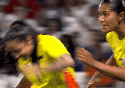 Woman In Yellow Jersey Number 1 Running GIF
