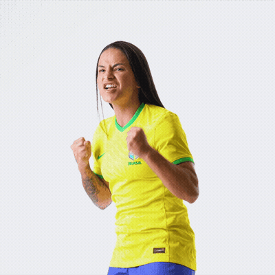 Woman In Yellow Jersey Saying Brasil GIF