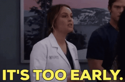 Woman In Yellow Lab Coat Says It's Too Early GIF